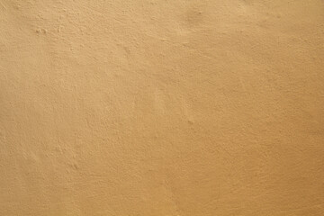 the surface of a wall is used as a background for a beautiful design.