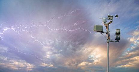 Weather station automatic measurement of weather parameters with Stormy sky and rain and lightning