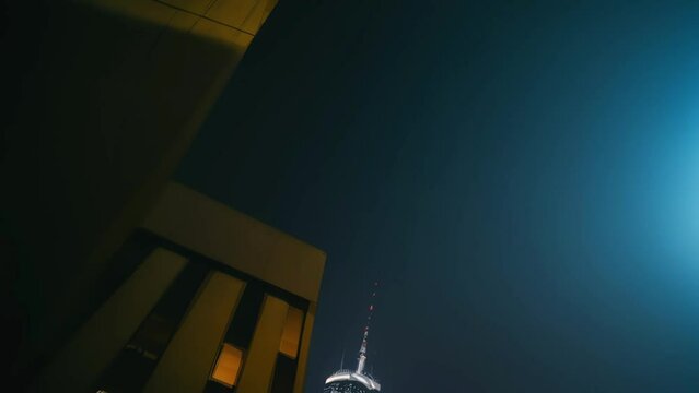 stunning night city animation, nighttime, blade runner, cyberpunk style, dark streets with shadows and reflecting lights
