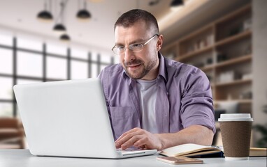 E-learning Focused guy looking at computer
