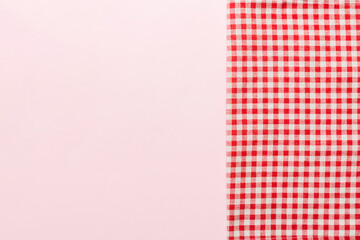 top view with red empty kitchen napkin isolated on table background. Folded cloth for mockup with...
