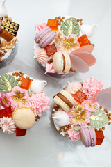 Set of beautiful traditional orthodox cakes decorated with glaze, meringues, chocolate, nuts, toffees, macaroons and jelly