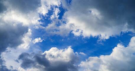 Blue sky with white clouds in sunny day background - 750746606