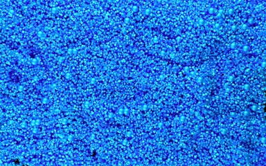Abstract 3d blue particles on dark background
