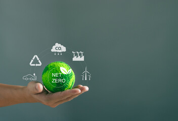 ESG Environmental, Social and Governance Concept.Sustainable Organization Development Businessman's hand holding a green ESG globe to plan investments with green businesses