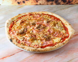 Pizza with barbecue sauce side view.