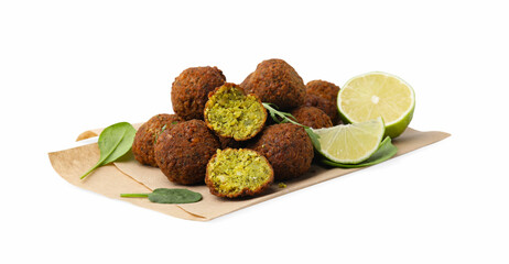 Delicious falafel balls, basil, arugula and lime isolated on white