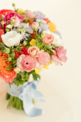 Wedding bouquet with colorful florals.