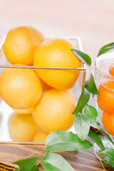 styled oranges in glass containers