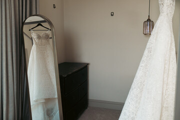 wedding dress on a hanger
