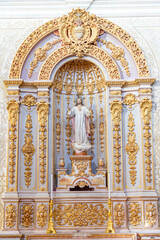 religious figure inside the Royal and parish church of São Pedro.