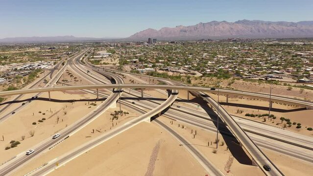 Daytime aerial view of the 10 and 19 freeway interchange in south Tucson, Arizona, USA.