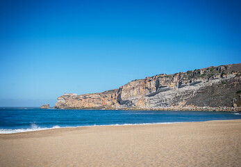 Beautiful panoramic view of the main beach Praia de Nazare in Nazare, Portugal