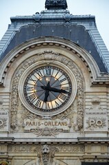 Paris, France 04.23.2017: Clock on the facade of the current Musée d'Orsay of Paris