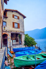 Fototapeta na wymiar Small boatyard on the bank of Lake Lugano in Gandria, Switzerland
