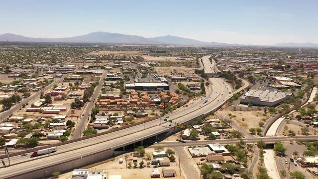 Tucson, Arizona, USA - May 28, 2022: Traffic passes on the 10 Freeway as it winds through the South Tucson neighborhood.