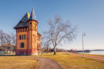 charming Owl Tower architecture along the Palic lake's embankment, creating a scenic backdrop for...