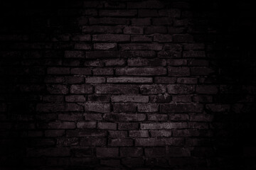 Black brick walls that are not plastered background and texture. The texture of the brick is black....