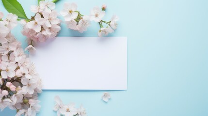 White Paper With Flowers on Blue Background