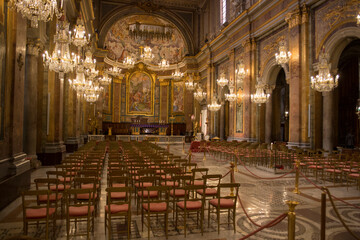 Interiors of the Basilica of Santi Giovanni e Paolo in Rome, Italy. It is a Catholic place of worship located on the Celian hill. It is nicknamed the Church of Chandeliers.