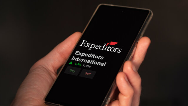 March 02nd 2024 Seattle, Washington. The logo of Expeditors International on the screen of an exchange. Expeditors International price stocks, $EXPD on a device.