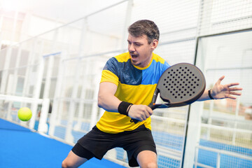Open Tour template. Dynamic Padel Player in Action. - 750813405