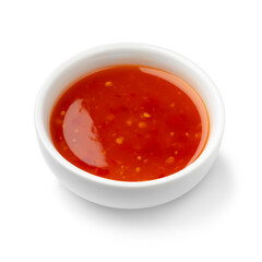 Single white bowl with sweet chili sauce isolated on white background close up