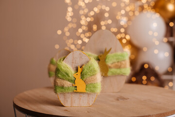 Naklejka premium Easter egg with wooden bunnies, Easter decoration, egg