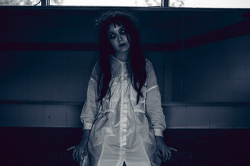 Portrait of asian woman make up ghost,Scary horror scene for background,Halloween festival...