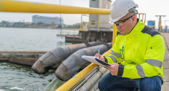 Environmental engineers work at wastewater treatment plants,Water supply engineering working at Water recycling plant for reuse