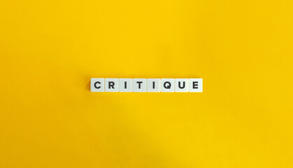 Critique Word. Text on Block Letter Tiles on Flat Background. Minimalist Aesthetics. - obrazy, fototapety, plakaty