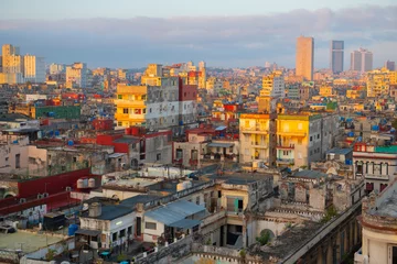  Central Havana (Centro Havana) aerial view with modern skyscrapers in Vedado with the morning light in Havana, Cuba. Old Havana is a World Heritage Site.  © Wangkun Jia
