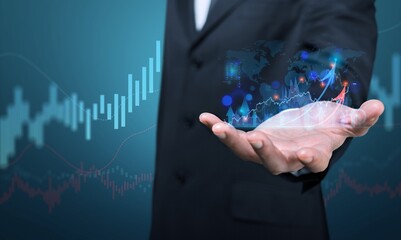 Businessman holding virtual graph chart 2024