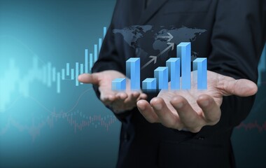 Businessman holding virtual graph chart 2024