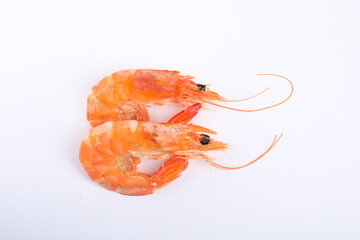 Delicious cooked shrimps isolated on white, top view