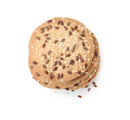 Stack of round cereal crackers with flax, sunflower and sesame seeds isolated on white, top view