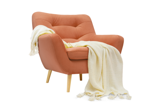 Comfortable coral pink armchair with white plaid isolated on white background.