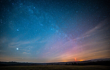 Beautiful night sky with aurora borealis in the Czech Republic