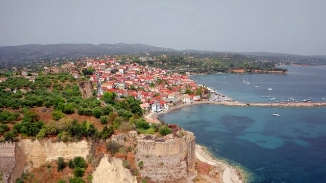 4k drone flight back and up footage (Ultra High Definition) of Koroni town, Messenia, Peloponnese, Greece, Europe. Colorful summer seascape of Ionina sea. Traveling concept background..