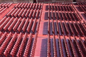rows of red chairs in the arena di Verona