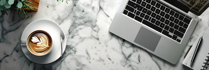 Laptop and coffee on marble table top - A laptop with a beautifully crafted coffee cup on a marble table signifying elegance and productivity - obrazy, fototapety, plakaty