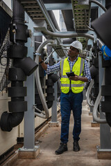 Fototapeta premium Industrial engineer work on site. engineer visit and inspection site engineer at industrial site. Inspector engineer check and working on site