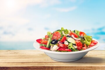 Greek salad tasty dith with beach background