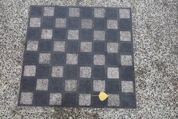 public street stone chessboard - obrazy, fototapety, plakaty