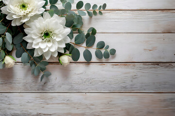 flowers on white wooden table in overhead view © lenny