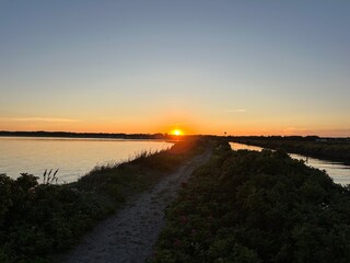 Obraz premium sunset over the river
