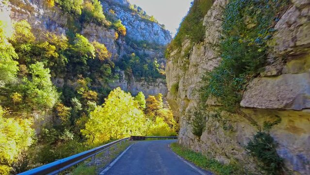 Driving through Foz de Arbayun canyon of Salazar River in the Pyrenees in Navarre Autonomous Community of Spain, Europe