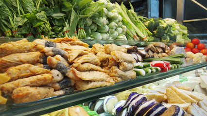 A beautiful display of food at a hawker center in Singapore