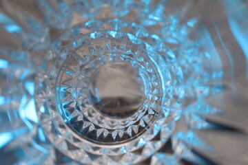 ornamentad crystalware with colorful light reflections