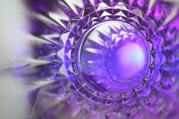 psychedelic glass vortex with pruple relfective light